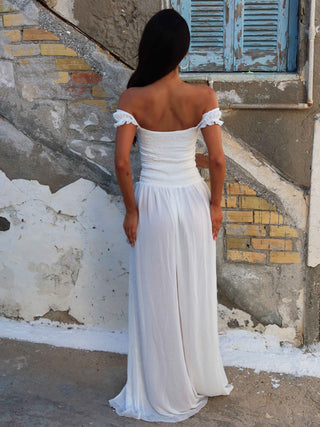 white off shoulder maxi dress Linen The / XS Stretchy crepe knit shapes this stunning gown that starts with a bustier Celestara Off The Shoulder Maxi